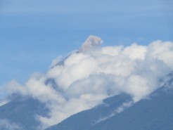 A volcano blowing a puff of smoke. I'm sure there was a tremor one morning.